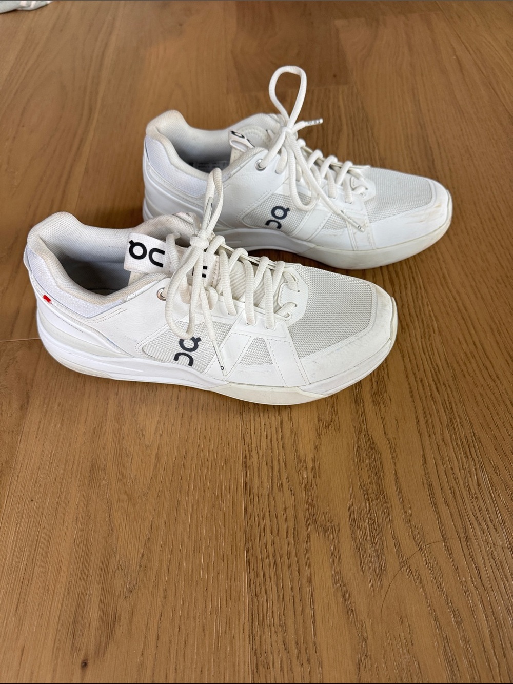 On Running White Low-Top Sneakers with Subtle Black Logo
